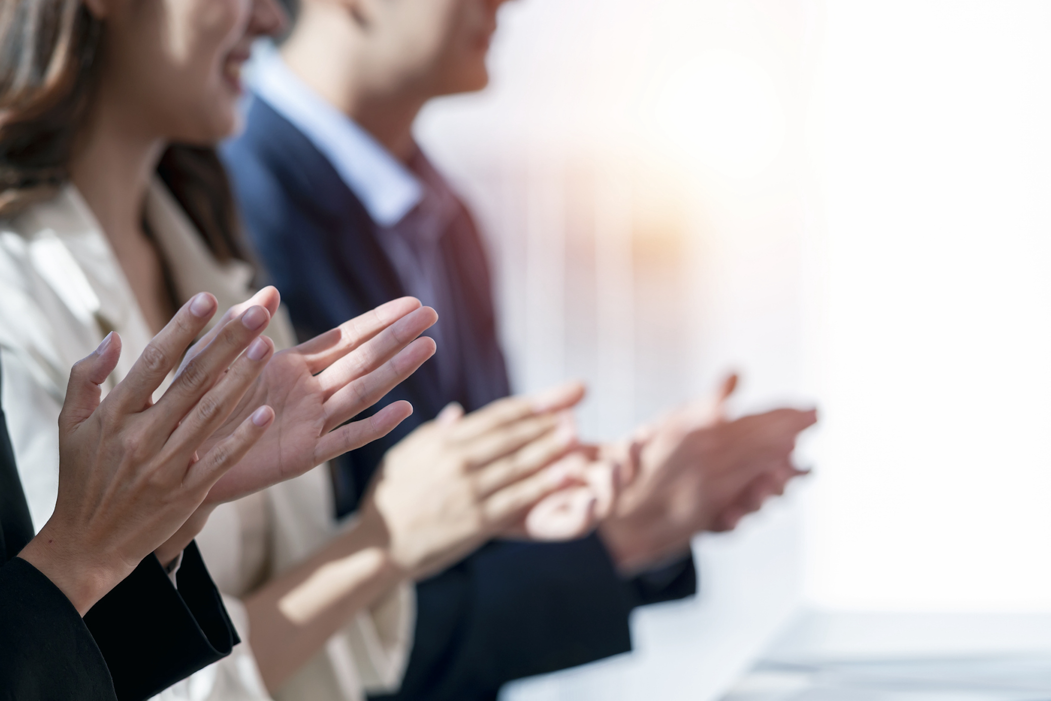 Business people applauding. Group of business people clapping in row. Banner background.